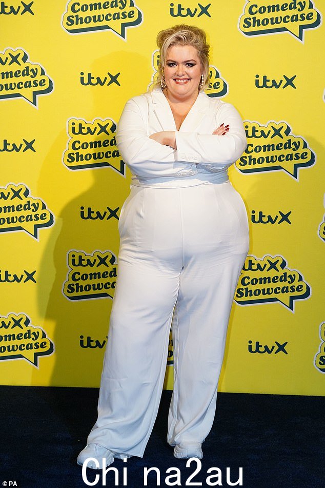 Good spirits: Former Jayde Adams in a white jumpsuit and a coordinated blazer