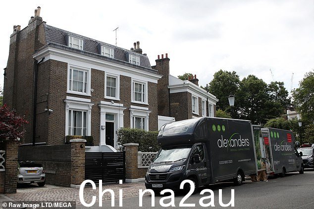 Moving out: Removal men got to work clearing out Simon Cowell's possessions on Tuesday after he quietly sold his £45 million mansion in Holland Park last week