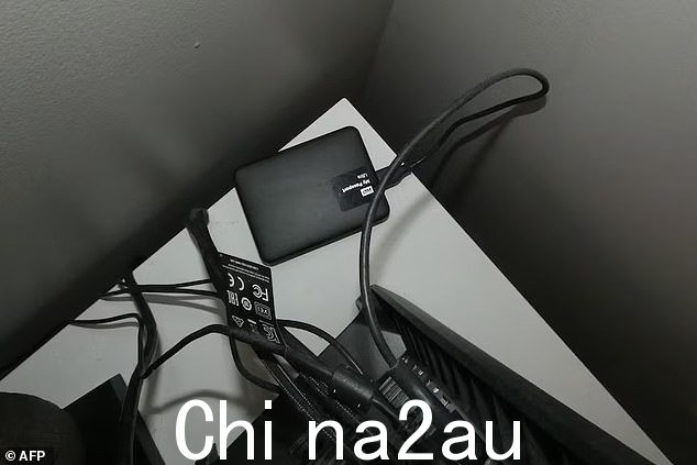 计算机设备被警方扣押,法新社称大多数被指控的澳大利亚男子都从事通信或 IT 领域的高科技工作