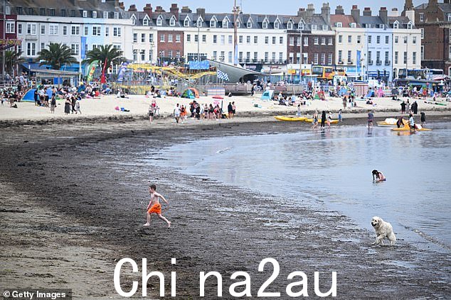 Children have also found themselves draped in its slimy strands as they come out of the water