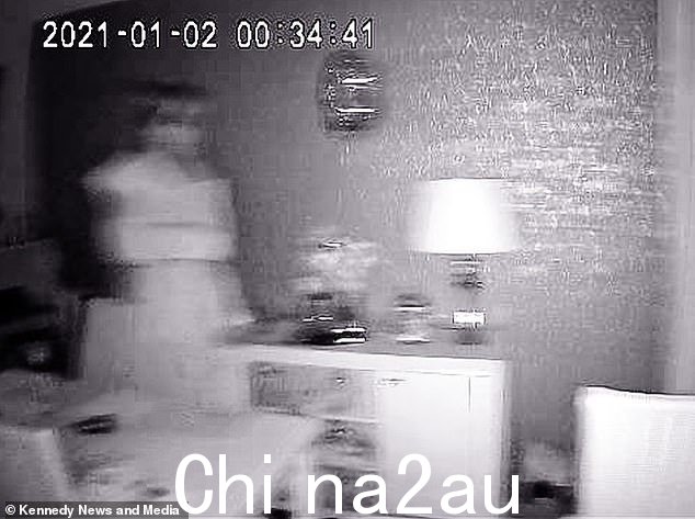 一对夫妇在默西塞德郡安特里的动作激活闭路电视摄像机上捕捉到金发碧眼的“幽灵新娘”后惊呆了