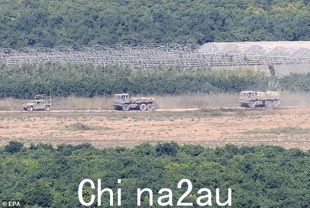 以色列军车周六穿越以色列和加沙地带北部之间的安全围栏