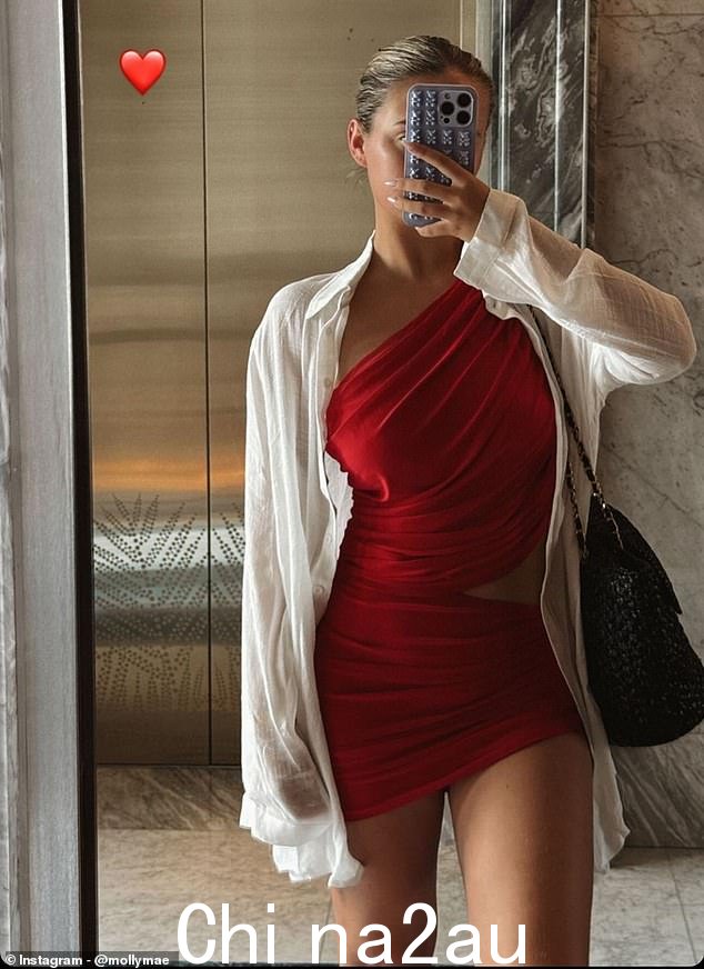 Moving to her Stories, Molly-Mae shared a selfie in front of a lift in the same outfit as earlier, but this time showing the gorgeous red dress she was also wearing