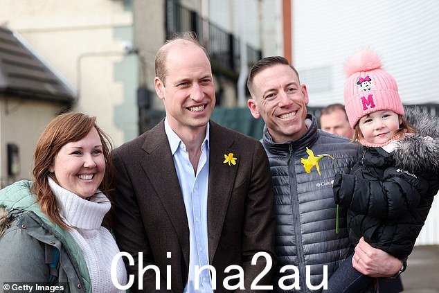 威廉与凯蒂·博伊尔,35 岁,丈夫大卫·博伊尔,37 岁,以及他们的女儿弗洛伦斯,3 岁,今天