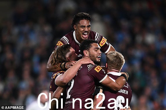 The Maroons 庆祝 Ben 2024 年 6 月 5 日星期三,在悉尼雅高体育场举行的 2024 年起源州第一场比赛中,昆士兰栗色队和新南威尔士州蓝调队之间的亨特尝试。(AAP 图片/Dan Himbrechts)不存档,仅供编辑使用