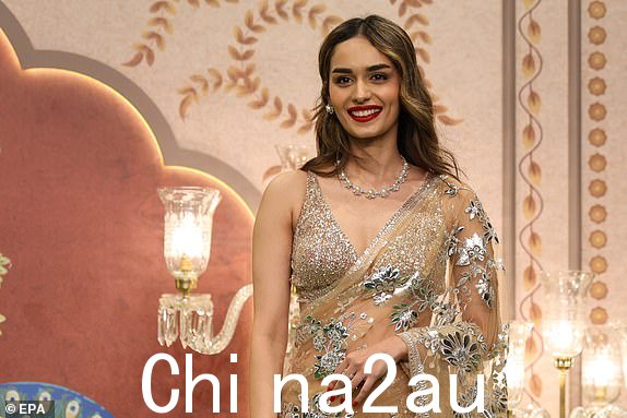 epa11476052 印度女演员、前“世界小姐”马努什·奇拉尔 (Manushi Chhillar) 于 2024 年 7 月 13 日在印度孟买参加信实工业董事长穆克什·安巴尼 (Mukesh Ambani) 之子阿南特·安巴尼 (Anant Ambani) 婚礼后的祝福仪式前摆姿势拍照。孟买参加 Anant Ambani 和他的新娘 Radhika Merchant 的盛大婚礼 EPA/DIVYAKANT SOLANKI