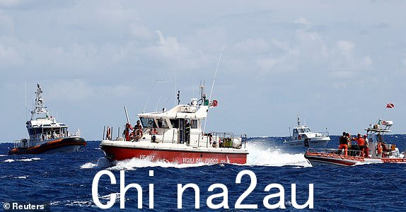 救援人员在救援区域工作2024 年 8 月 20 日,一艘豪华游艇在意大利西西里岛巴勒莫市附近的波蒂塞洛海岸沉没。 REUTERS/Guglielmo Mangiapane