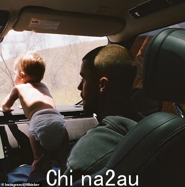 One photo featured Bieber holding Jack while exploring nature, while another showed the adorable little boy standing on his lap in the passenger seat of a car and staring out the windshieldx