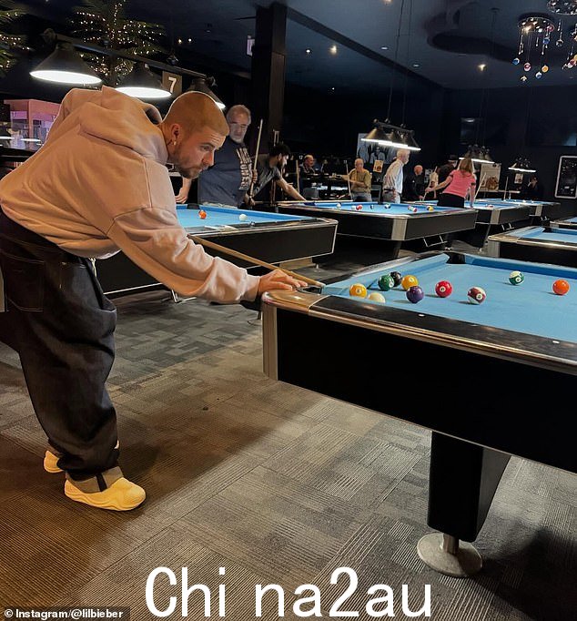 Later on Thursday, Bieber appeared to have a night on the town without baby Jack. He posted photos of himself visiting a pool hall and playing darts