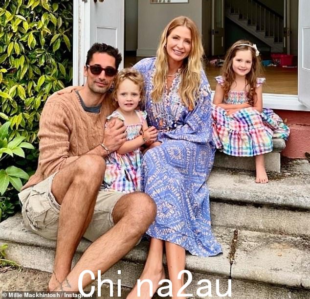 Pictured with Hugo and their two daughters