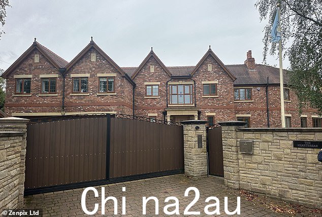 The boxing icon was found at his home (pictured) in Greater Manchester this morning, where a police cordon currently sits outside. His death is not being treated as suspicious