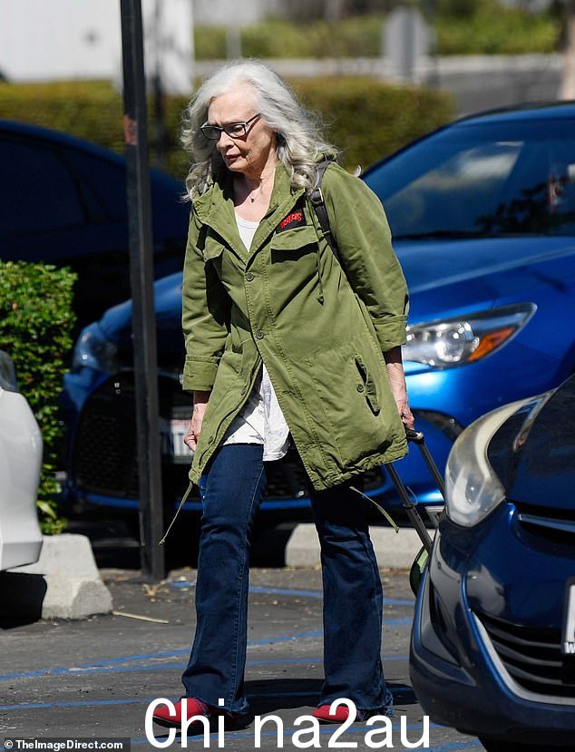In the new images, the star is seen with her gray hair worn in soft curls over her shoulders as she sported light makeup and rectangular prescription glasses