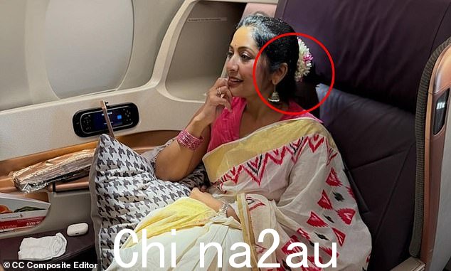 Navya Nair was given a garland of flowers to wear for the first leg of her journey from Kochi, India, to Singapore, and another garland for the second leg to Melbourne
