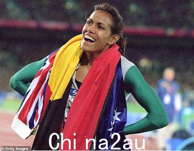 A proud Indigenous woman, Freeman later celebrated with the Australian and Aboriginal flags draped around her neck (pictured)