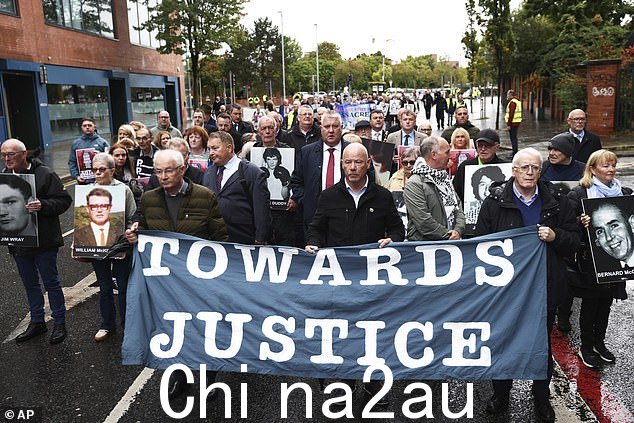 Families of Bloody Sunday victims marched towards Belfast Crown Court on Monday